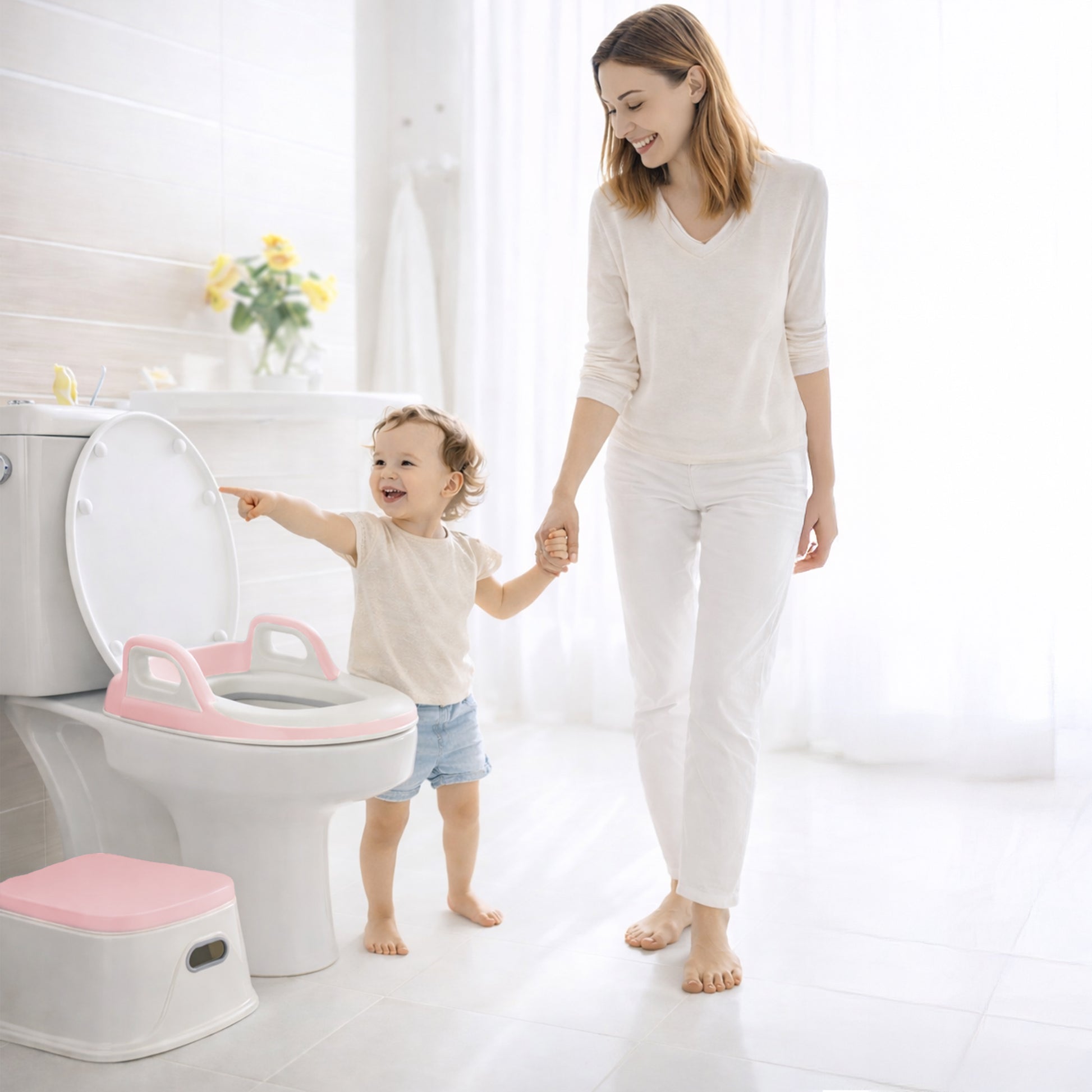 Child on grey potty training stool – lightweight kids bathroom step stool and toilet trainer