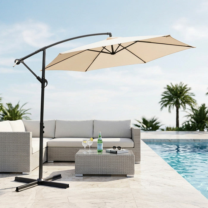 Cream 3m cantilever garden parasol providing shade beside a swimming pool with outdoor sofa set