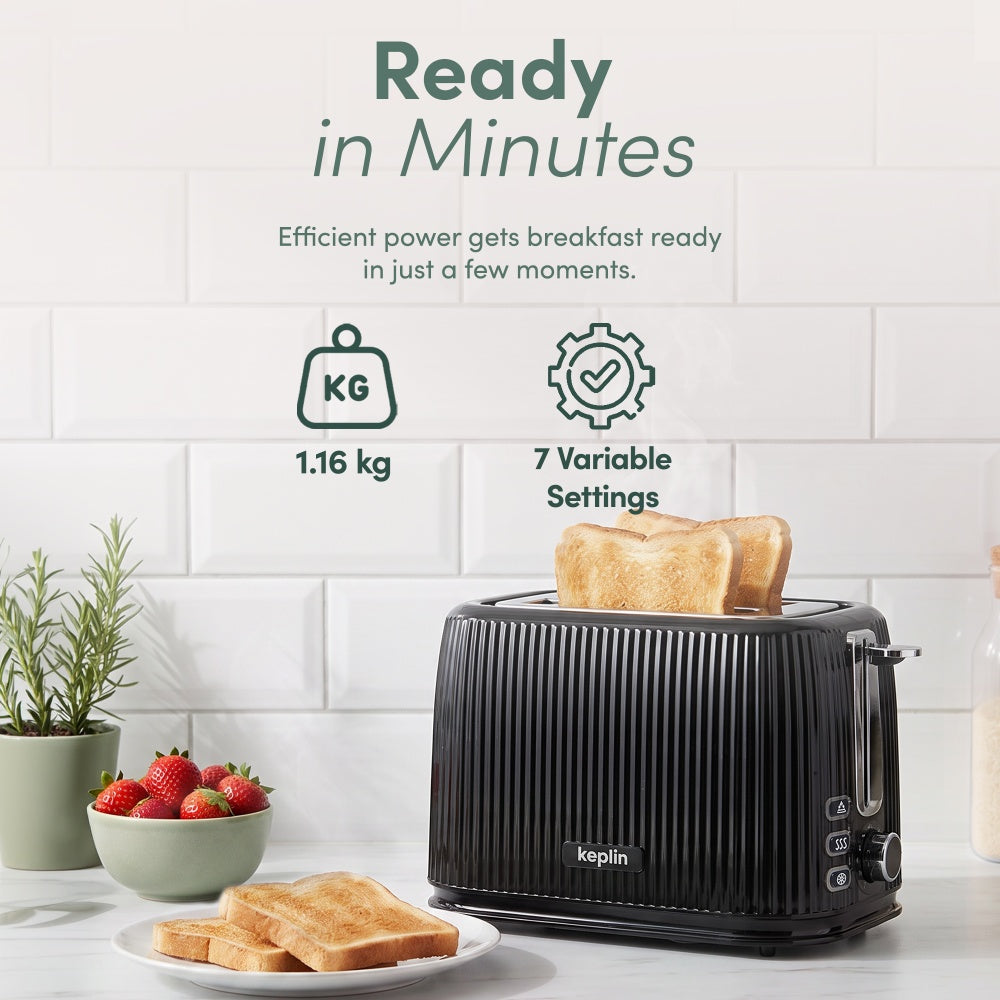 Keplin 2 slice toaster weighing 1.16kg with toast popped up on a kitchen counter