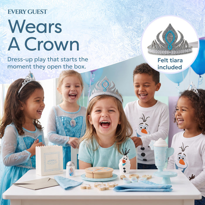 Children playing Frozen party with Elsa tiara and Disney tea party accessorie